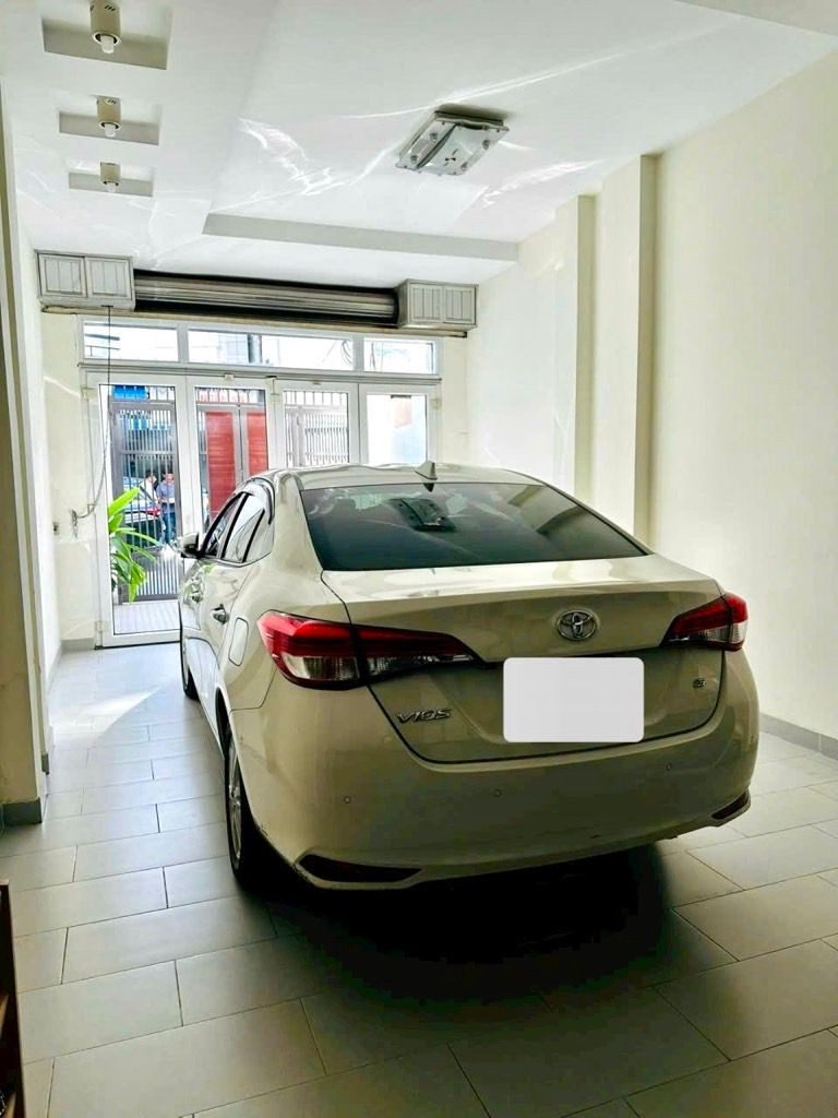Nhà bán 4 tầng bùi đình túy 68m2 sổ hồng riêng