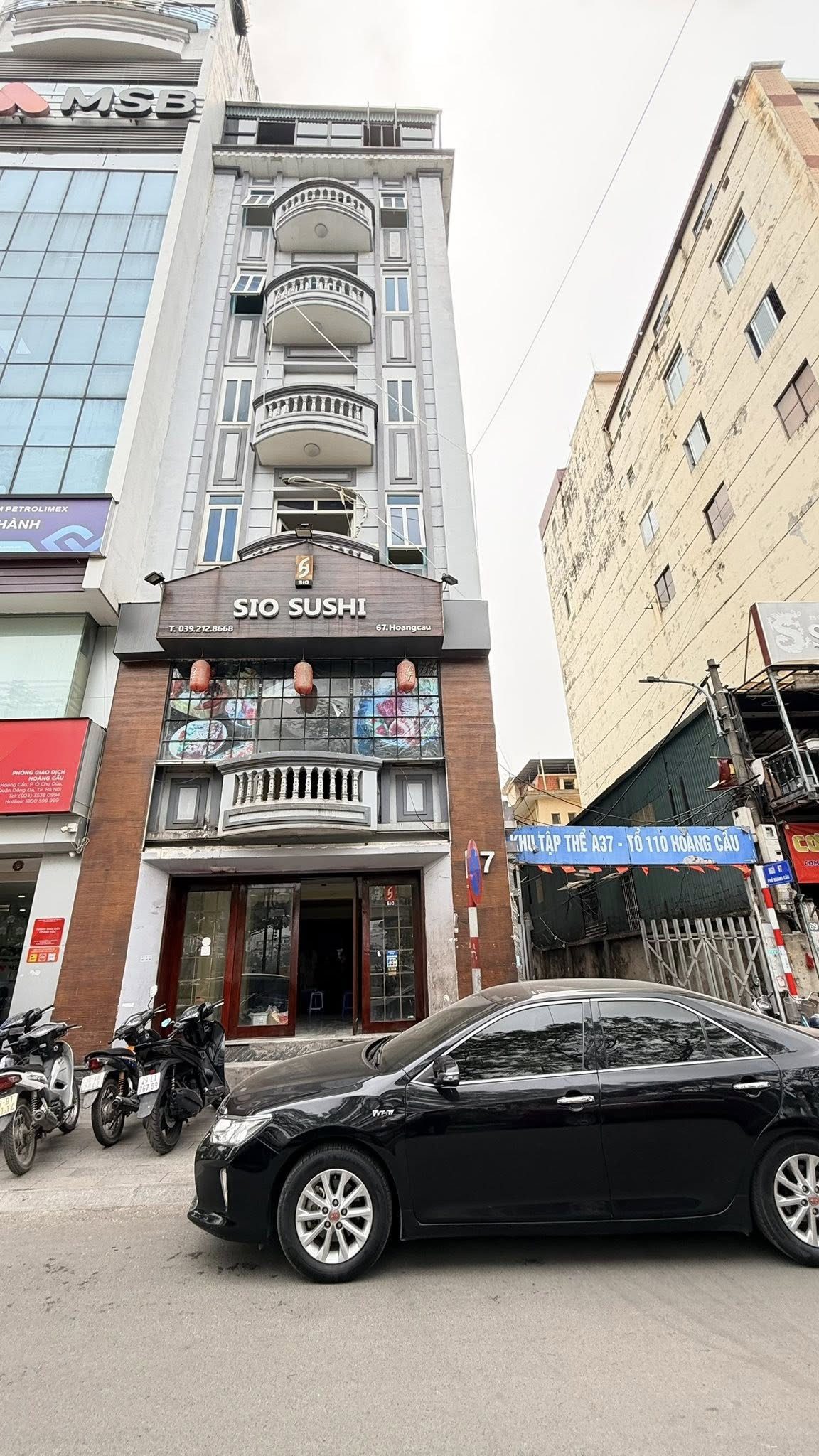 BÁN TÒA NHÀ MẶT PHỐ HOÀNG CẦU. 6 TẦNG. THANG MÁY. LÔ GÓC.