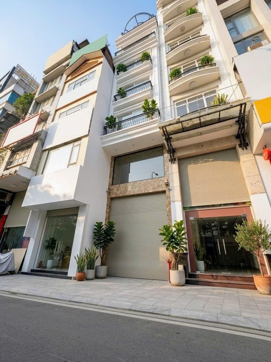 Mặt phố  Khuất Duy Tiến kinh doanh sầm uất 💥 Tòa nhà văn phòng đẳng cấp 100m2 x 8 tầng thang máy – 2 mặt tiền trước sau, vỉa hè 10m