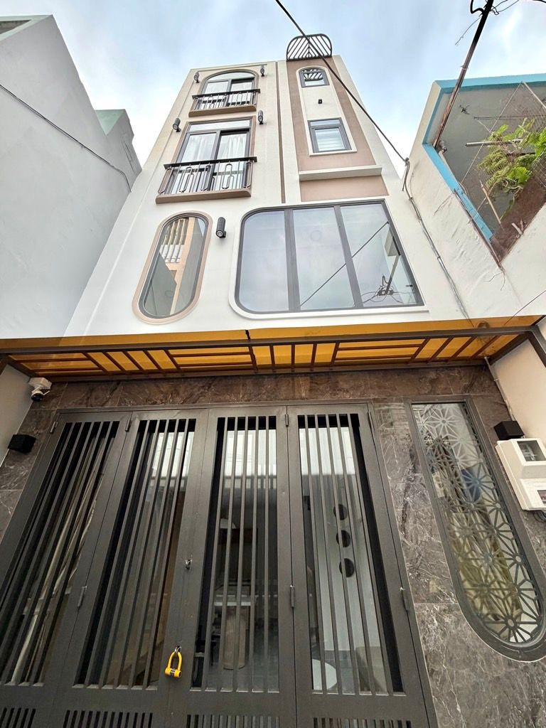 Bán nhà mới bình thạnh 4 tầng, gần q1