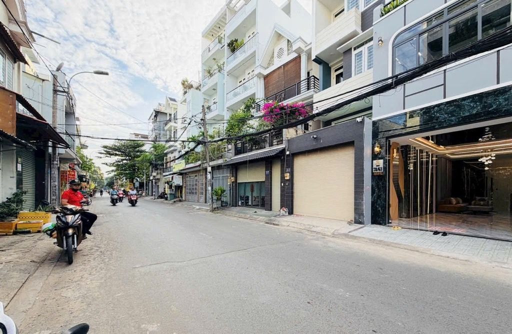 Mặt tiền hẽm kinh doanh, sổ hồng riêng, 5 tầng thang máy hoàng công đủ