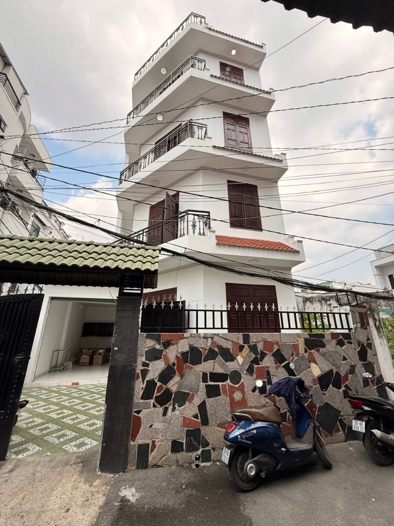 Nhà bán lô góc phan huy ích 5 tầng hẽm xe hơi thông