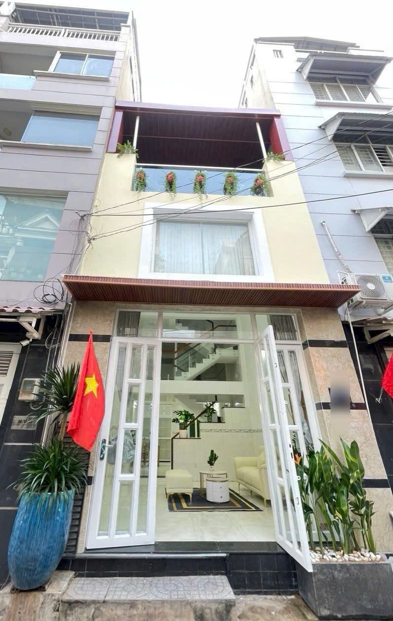 BÁN NHÀ 2 TẦNG 1 LỬNG - HẺM 7M XE HƠI TRÁNH NHAU - SÁT VÁCH PHẠM VĂN ĐỒNG