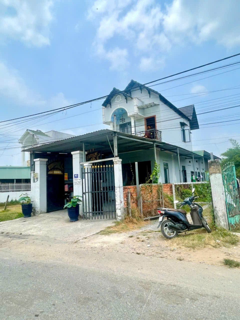 Bán nhà lầu góc 2mt đường nhựa / tỉnh lộ 15, xã Trung An dt 168m2 kèm 3 phòng trọ giá 3,8 tỷ