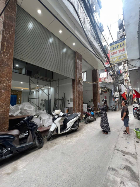 BÁN NHÀ MẶT NGÕ Ô TÔ ĐƯỜNG VŨ TÔNG PHAN. 65M2 - 7 TẦNG. THANG MÁY.