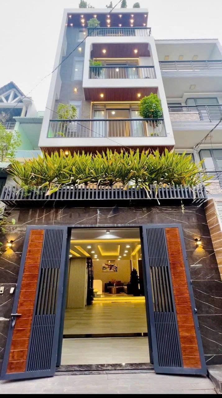Kẹt tiền bán gấp 49m2 Hoàng Hoa Thám,Bình Thạnh giá 3tỷ550. Gần chợ Cây Quéo. Hẻm 4,5m. Sổ riêng.