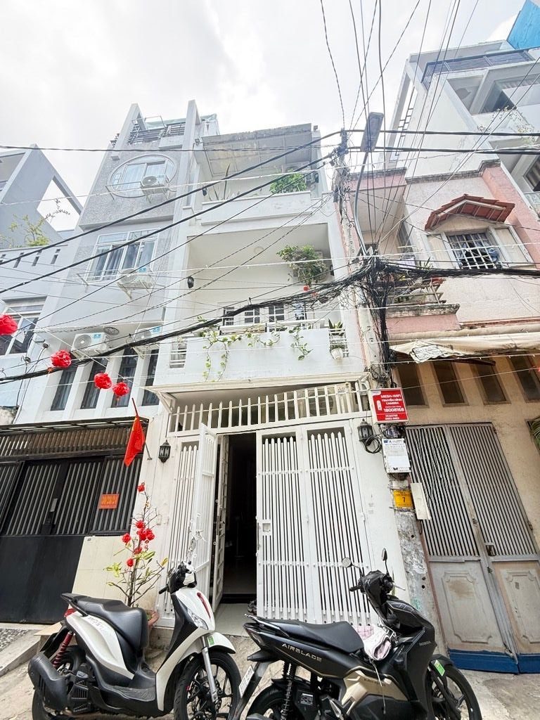Nhà bán phùng văn cung phú nhuận 4 tầng sổ hồng riêng