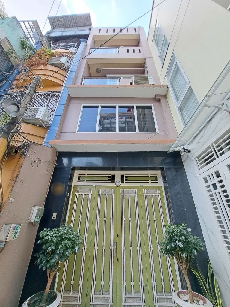 Bán nhà Nguyễn Trọng tuyển năm tầng hẻm xe hơi gần sân bay.