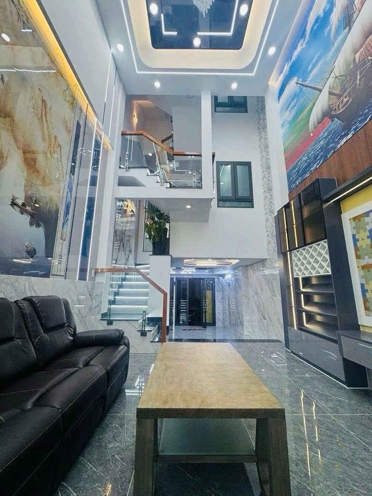 BÁN NHÀ GẤP TẾT GẦN LÊ VĂN QUỚI ,Nhà mới xây 5 TẦNG, Ô TÔ NGỦ TRONG NHÀ (4x14), GIÁ 6.9 TỶ