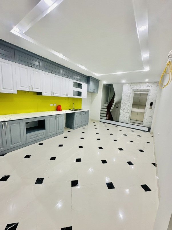 Bán nhà Định Công Thượng – Giá 14.6 tỷ – DT 55m² x 7 tầng – MT 4m – thang máy, ngõ rộng, sân lớn