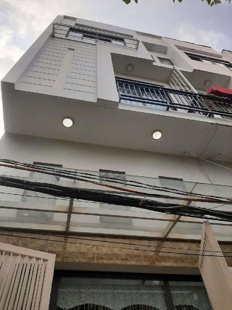 Bán nhà 5 tầng phường Tân Phú cạnh chợ Tân Mỹ; ngang 4,1m; an ninh dân trí cao cách MT 35m