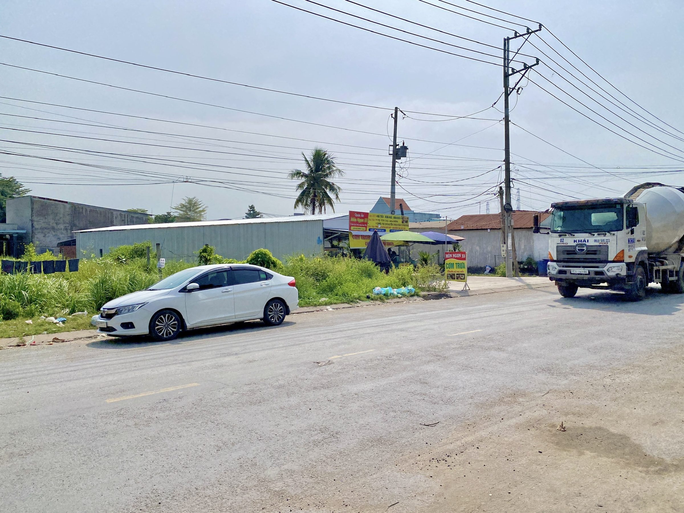 Bán đất 578m² ngang 15m giá 9.9 tỷ mặt tiền đường ĐT 833B, ngay chợ Long Cang, tiện kd cho thuê kho bãi