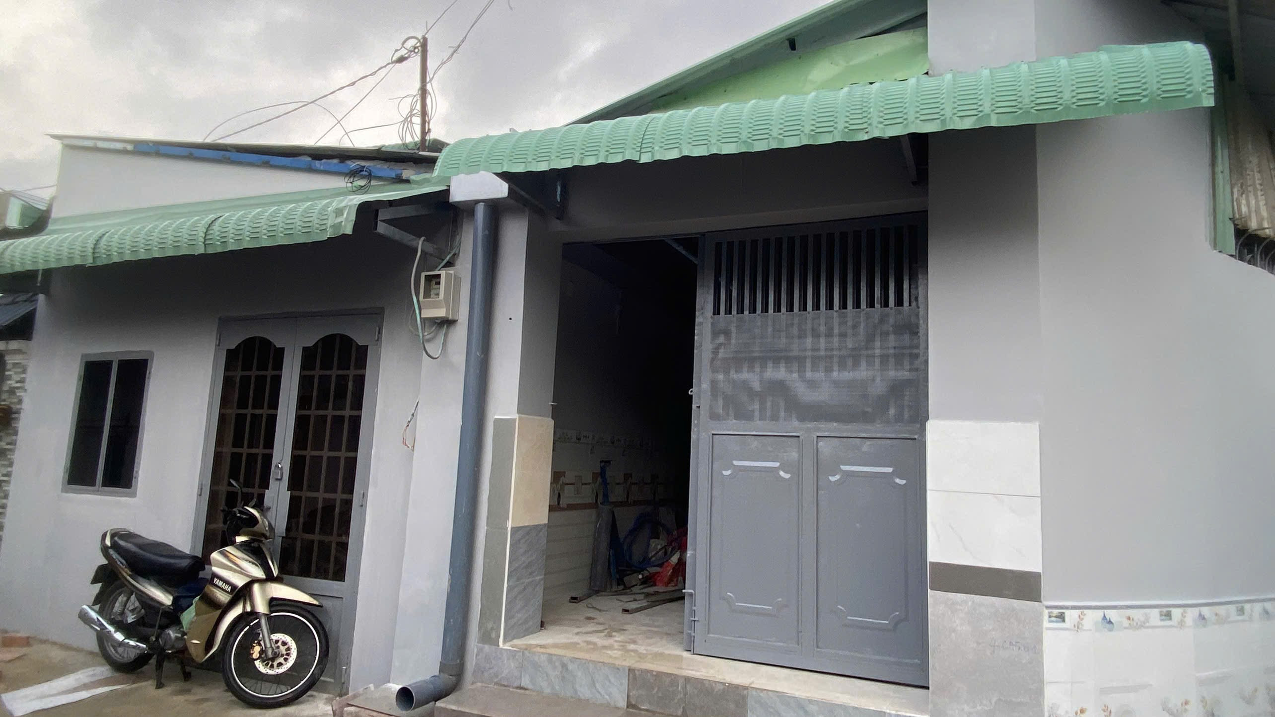 Bán nhà 10*10.5m 2 căn đang cho thuê 7tr. Tân Thới Nhì. Hocmon