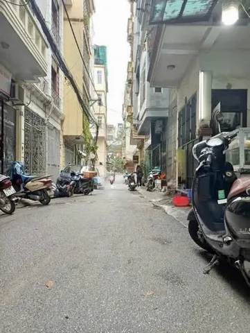 Nhà 5 Tầng 71m² MT 5.1m Thái Thịnh - Đống Đa, 4PN, Kinh Doanh Tốt, Ngõ Ô tô Tránh, 31.5 Tỷ