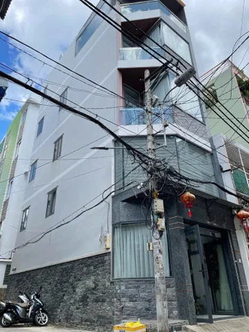 Bán nhà đẹp 5 tầng , căn góc 2 Mặt tiền kế bên chợ Phạm Văn Hai