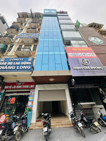 BÁN TÒA NHÀ MẶT ĐƯỜNG NGUYỄN XIỂN. 60M2 - 8 TẦNG. THANG MÁY. KINH DOANH.
