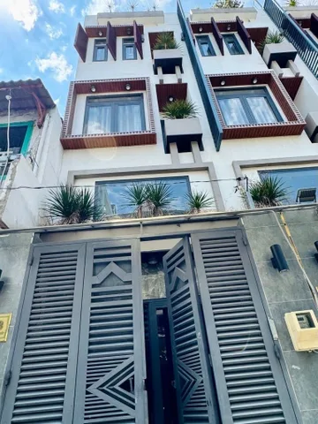 Gấp bán nhà 5 tầng hẽm xe hơi, sổ hồng riêng.