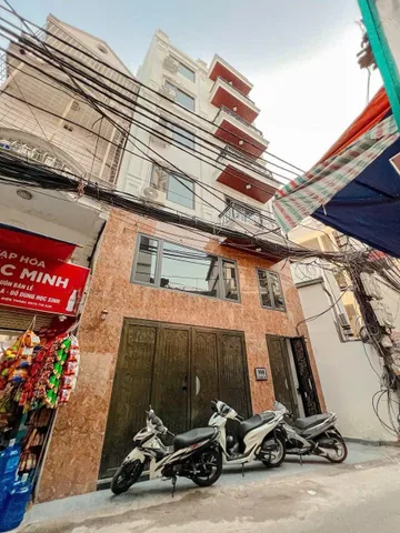 BÁN TÒA NHÀ CHDV MẶT ĐƯỜNG HOÀNG MAI. 90M2 - 7 TẦNG. THANG MÁY. 11 CĂN HỘ.