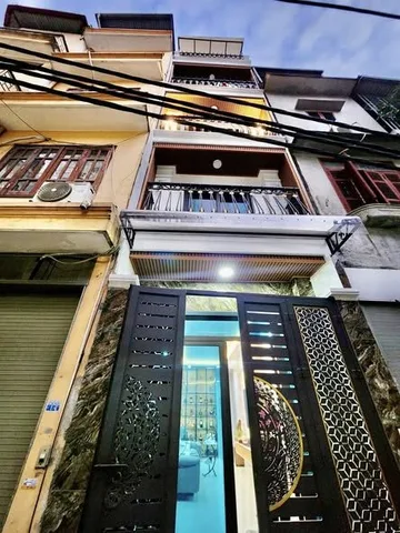 BÁN NHÀ PHỐ THỊNH QUANG. ĐỐNG ĐA. 5 TẦNG. THANG MÁY. GARA Ô TÔ.
