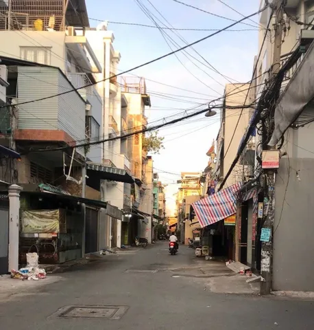 TÂN BÌNH GIÁP QUẬN 10 - HẺM 5M THÔNG Ô TÔ ĐỖ CỬA - 4 LẦU - 7 CHDV - DÒNG TIỀN 35 TRIỆU - CHỈ HƠN 7 TỶ.