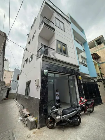Bán nhà phan xích long 4 tầng thang máy, sổ hồng riêng.nhà mới kinh doanh