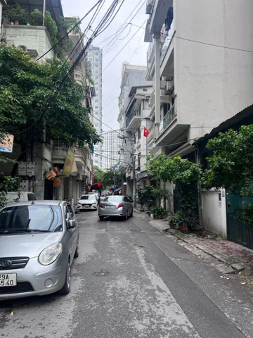 Nhà ngõ ô tô tránh, đầu hồ hai mặt tháng 80 m2 x 5 tầng, tiện kinh doanh, làm văn phòng