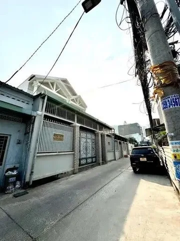 BÁN NHÀ TRỆT LỬNG MẶT TIỀN ĐƯỜNG XE TẢI QUẬN 7