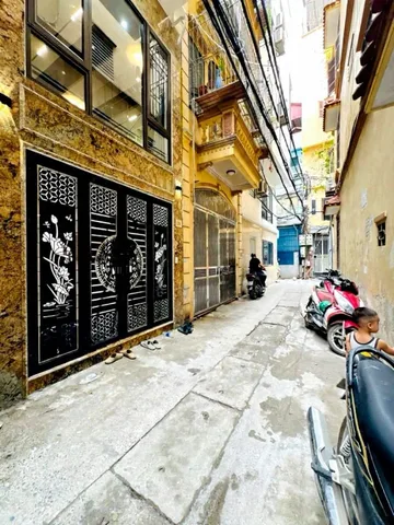 nguyễn văn huyên 48m x6 tầng thang máy 15,8 tỷ gara ô tô,ngõ thông kinh doanh