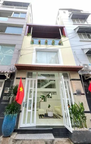 BÁN NHÀ 2 TẦNG 1 LỬNG - HẺM 7M XE HƠI TRÁNH NHAU - SÁT VÁCH PHẠM VĂN ĐỒNG