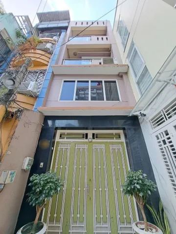 Bán nhà Nguyễn Trọng tuyển năm tầng hẻm xe hơi gần sân bay.