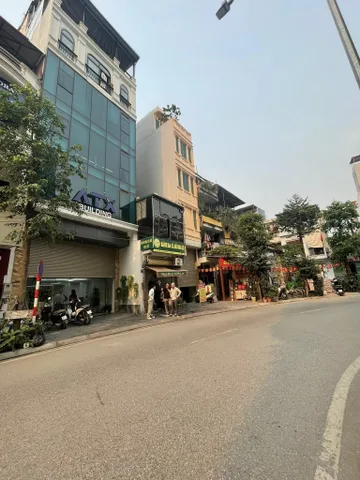 BÁN TÒA NHÀ MẶT PHỐ LƯƠNG ĐÌNH CỦA. 100M2 - 8 TẦNG. THANG MÁY. THÔNG SÀN.