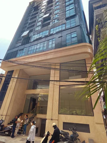 BÁN TÒA NHÀ ĐƯỜNG LÊ VĂN LƯƠNG. 110M2 - 9 TẦNG. THANG MÁY. LÔ GÓC.