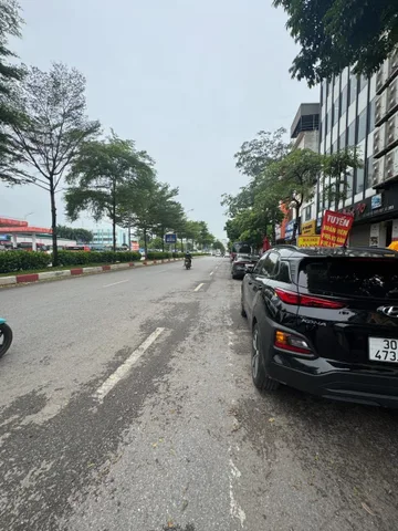 BÁN TÒA NHÀ MẶT ĐƯỜNG TRẦN VỸ. 120M2 - 10 TẦNG. THANG MÁY. THÔNG SÀN.