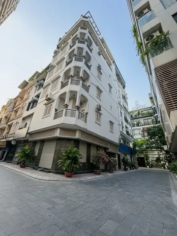 Phân lô VIP Nguyễn Chí Thanh 💥 Tòa nhà lô góc vỉa hè ngõ thông sát phố – 85m2 x 7 tầng thang máy