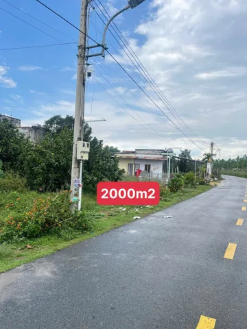 Chủ cần tiền bán gấp lô đất 2000m2, đường nhựa 16m, đối diện có dãy trọ 20 phòng