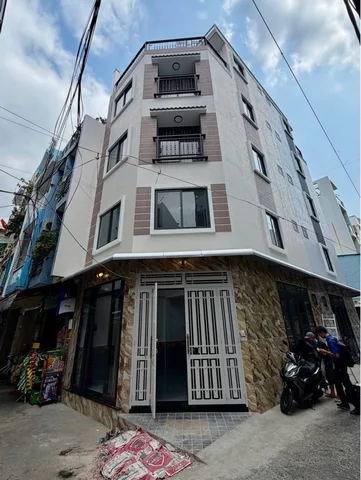 VIP PHÚ NHUẬN – NHÀ LÔ GÓC 5 TẦNG HUỲNH VĂN BÁNH – XE HƠI NGỦ TRONG NHÀ