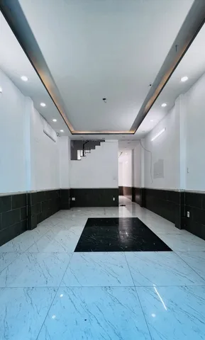 Nhà 4 tầng đúc BTCT; hẻm 4,5m liền kề EcoGreen; 4PN; cách Q4 1km; hẻm 1 sẹc cách mặt tiền 100m
