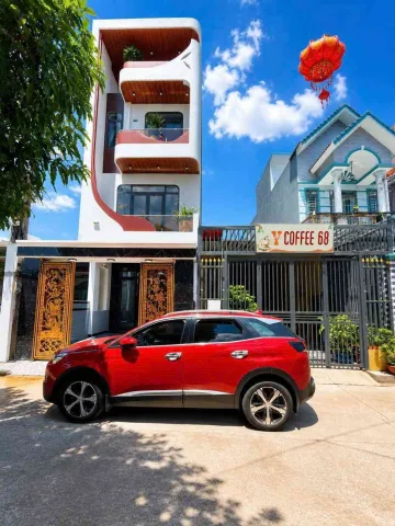 NHÀ ĐẸP TT ĐÔNG HÒA NGAY CHỢ DĨ AN.DT 100M2(5×20)FULL ĐG XE HƠI