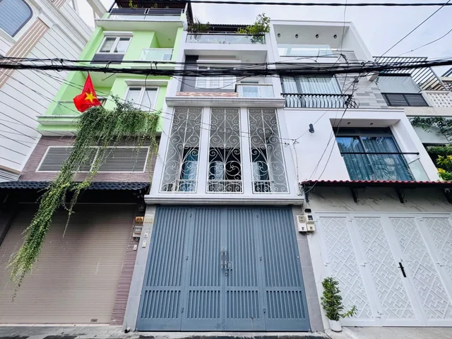 Nhà bán lê quang định 4 tầng 70m2 hẽm xe hơi