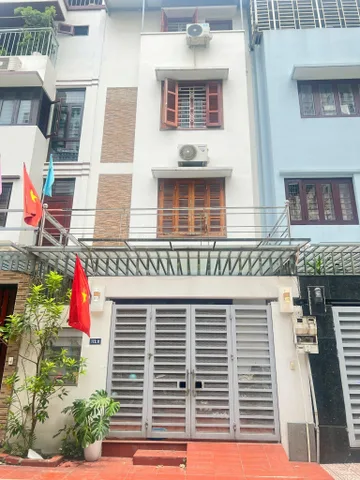 Bán NHÀ LIỀN KỀ ĐƯỜNG HOÀNG VĂN THÁI. 87M2 - 4 TẦNG. GARA Ô TÔ.