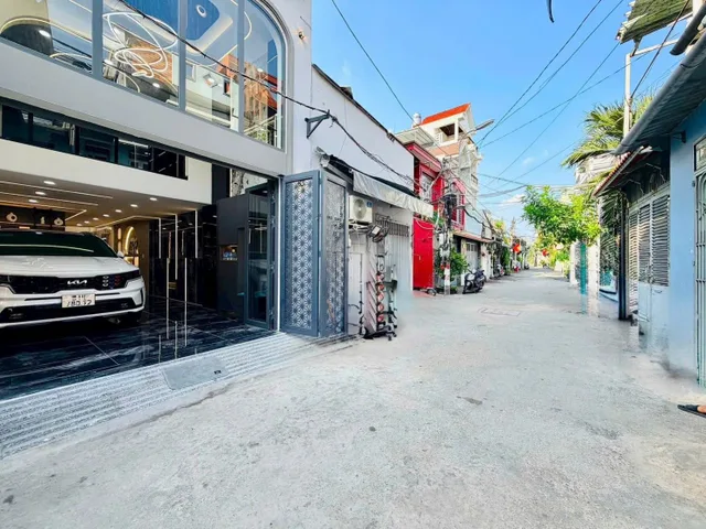 Bán nhà xây mới có thang máy hẻm xe tải  1 trục Phan Huy Ích p14 Gò Vấp