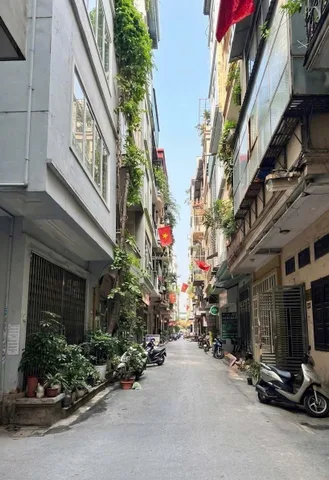 Bán nhà Ngã Tư Sở 50m-5 tầng- thang máy 10 phòng,20m ra ô tô tránh