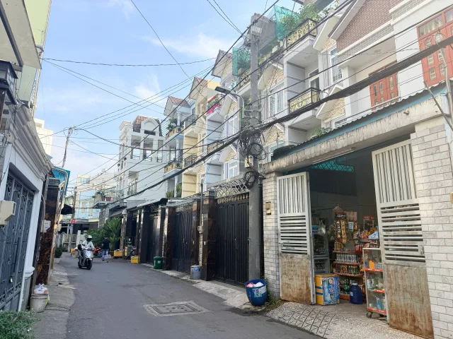 BÁN NHÀ hẻm ô tô Quận 2, đường thông nhà 3 tầng sàn 244,2m2 gần chợ Tân Lập, GIá TLCC