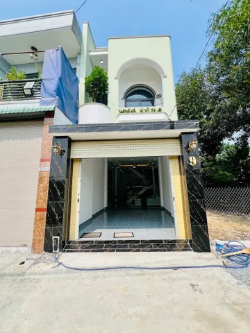 Nhà trệt lầu mới đẹp trung tâm Phú Mỹ (phường Bình Dương-TP.HCM) gần trường chợ Phú Mỹ,TP.Mới đường oto giá êm