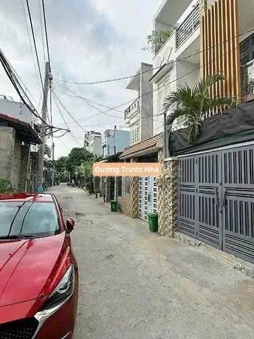 Nhà Trệt Lầu sân xe hơi Đường số 48 phường hiệp bình chánh Thủ Đức, sổ hồng 72m2