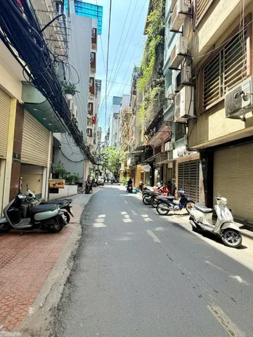 Bán nhà mặt phố Đê La Thành Nhỏ thoáng trước sau, Dt 70m2, 7t, mt 6m, giá 20 tỷ.