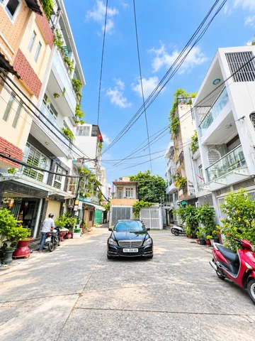 Bán Nhà 93m2 - 5 lầu - Nhỉnh 12 tỷ hẻm ô tô né nhau ngay Lê Văn Duyệt