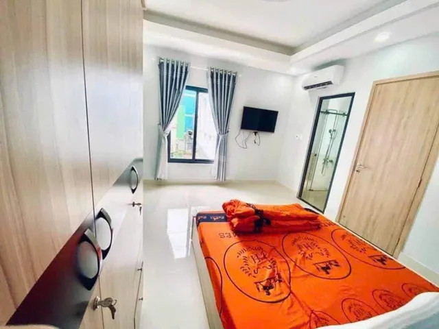 CHDV NGUYỄN VĂN ĐẬU Ô TÔ ĐẬU CỬA 5 TẦNG BTCT 7PN THU 40 TR/TH 8,2 TỶ