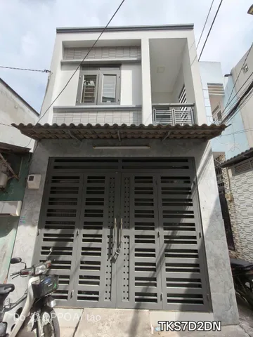 Nhà đẹp ơ ngay 2 tầng kiên cố, 3 mặt thoàng , hẻm thông. tại ngã tư 4 xã, giáp tân phú, chỉ hơn 3 ty